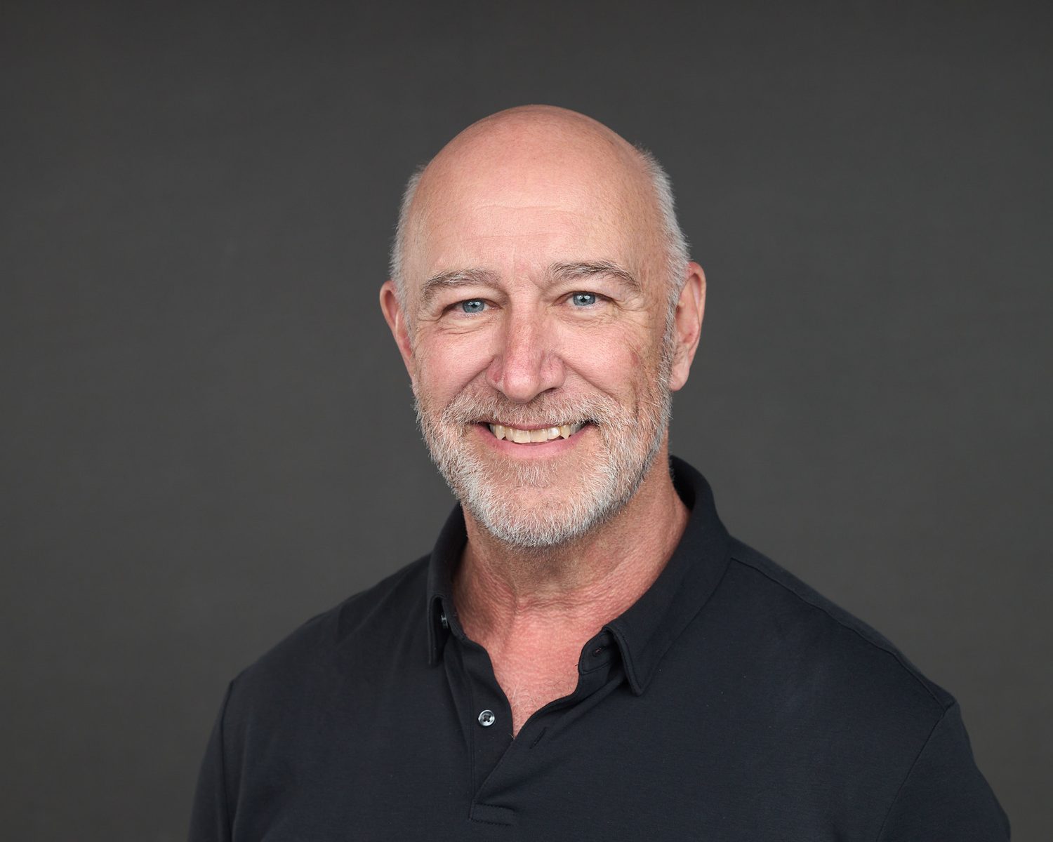 Executive headshot photographed at a corporate summit