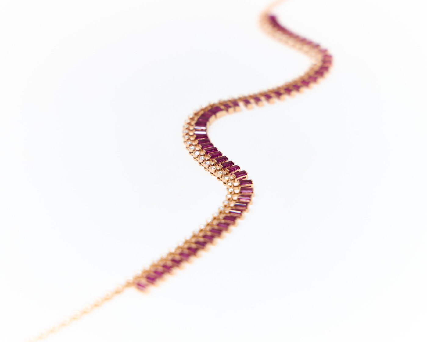 Ruby baguette and diamond rose gold bracelet, macro detail shot