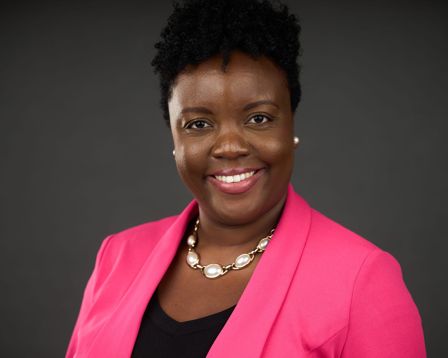 Corporate team headshot with consistent studio lighting