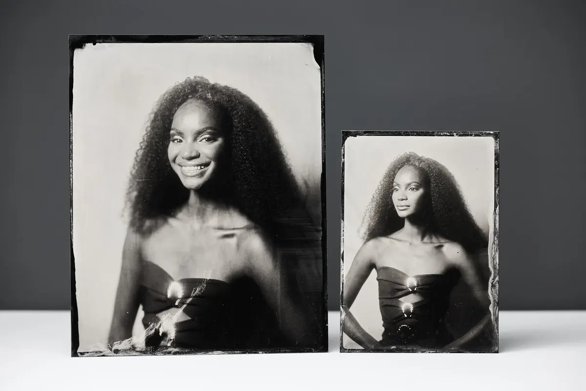 Two finished tintype plates on display
